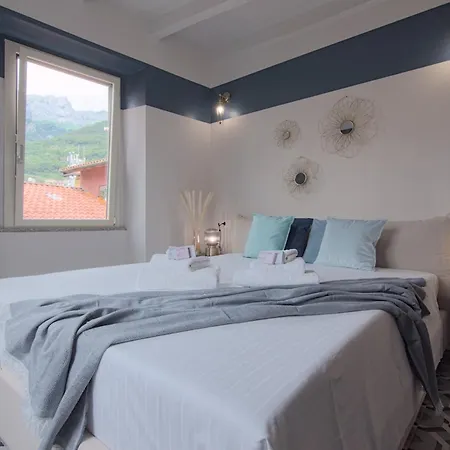 Апарт-отель Larionest Modern In The Center 5 Min From The Station Манделло-дель-Ларио